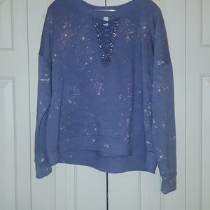Purple long sleeve top with crossing in front